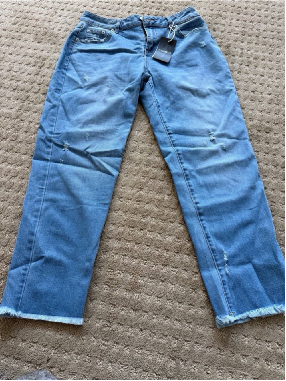 Flamingals distressed denim jeans with a raw, frayed hem light blue M